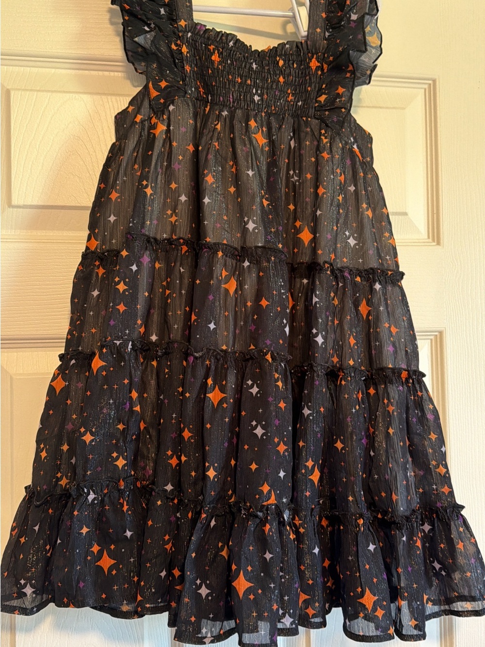 cheeky plum Black Tiered Dress with Orange and Purple Star Print